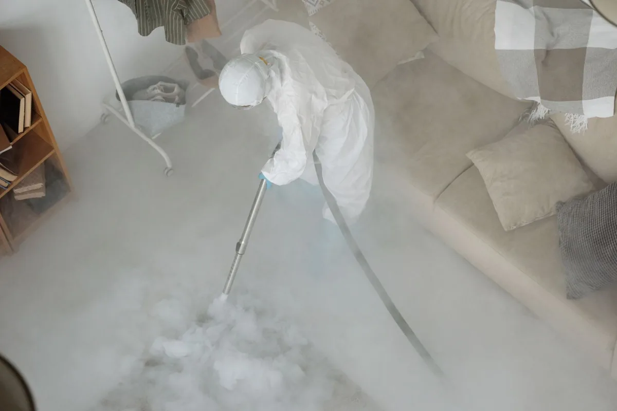 Biohazard cleanup technician in protective equipment, Beckley, WV